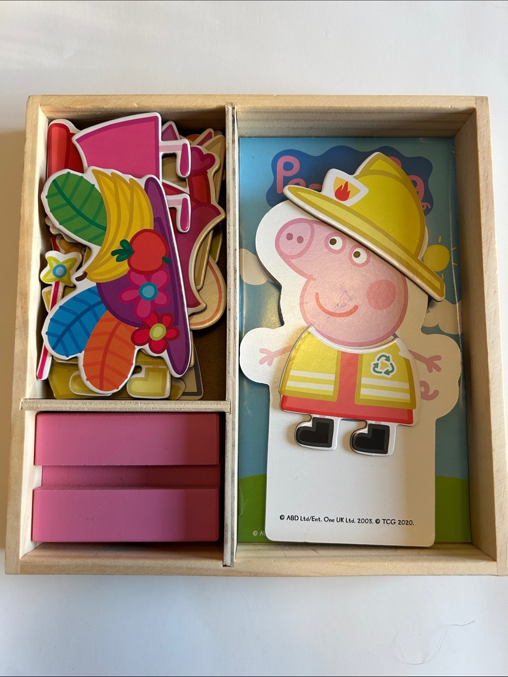 Peppa Pig Mix & Match Wooden Magnetic Outfit Set - Pink, Yellow, Red